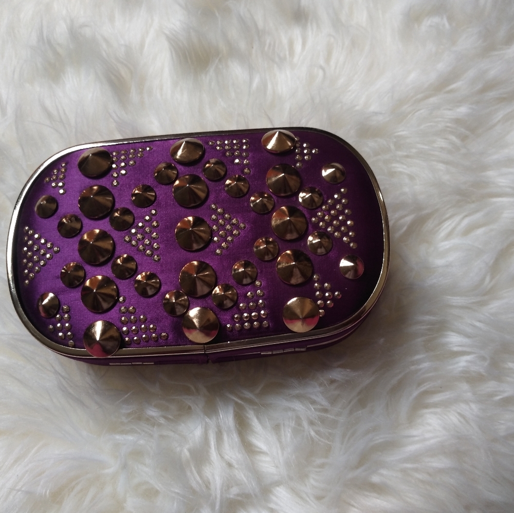 Purple clutch bag